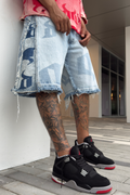 De Vinci bleached indigo baggy jorts jeans, showing relaxed fit denim with distressed details and a casual style.