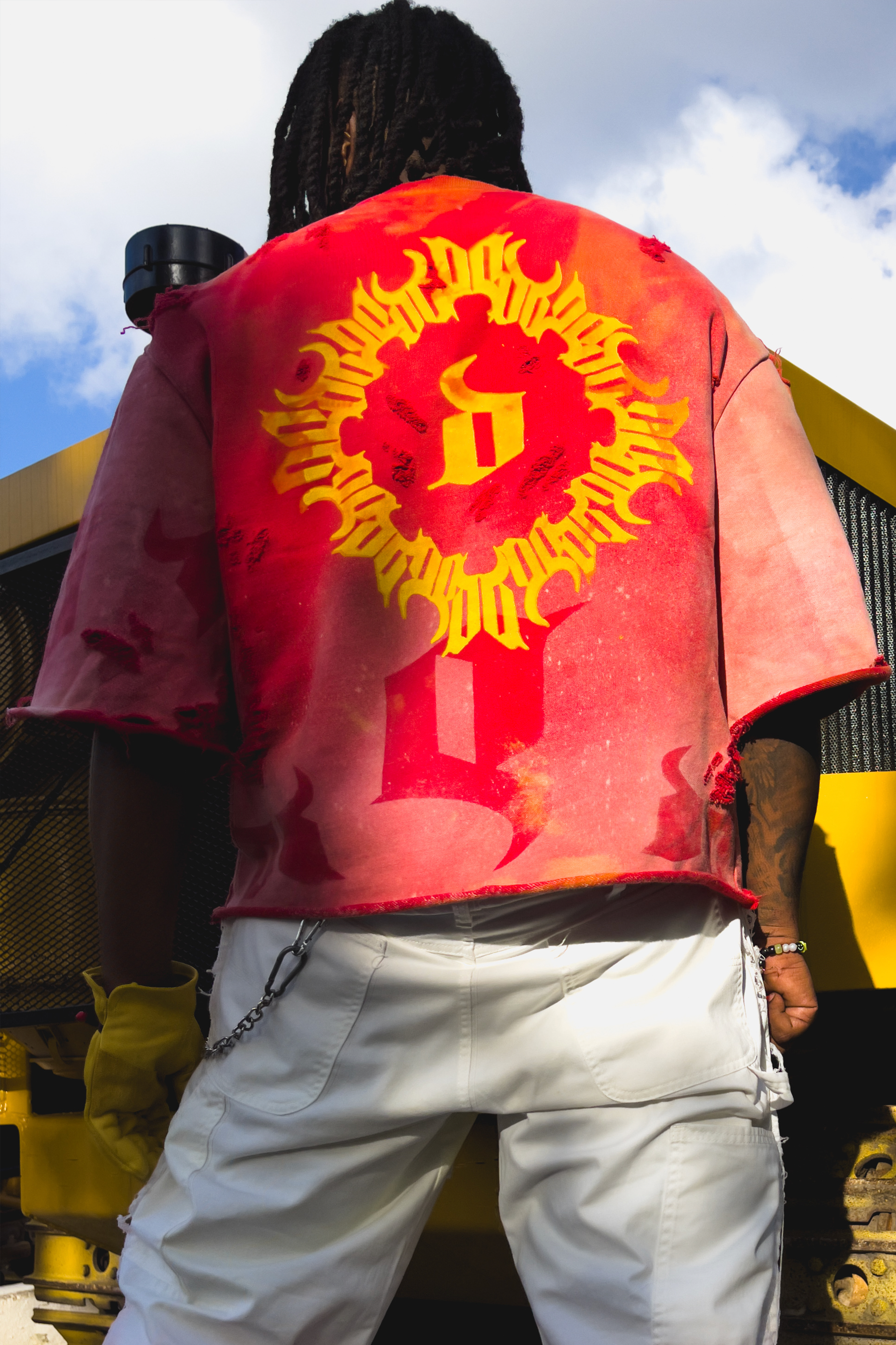 De Vinci "Inferno" cropped crewneck shirt featuring a fiery graphic design on soft fabric.