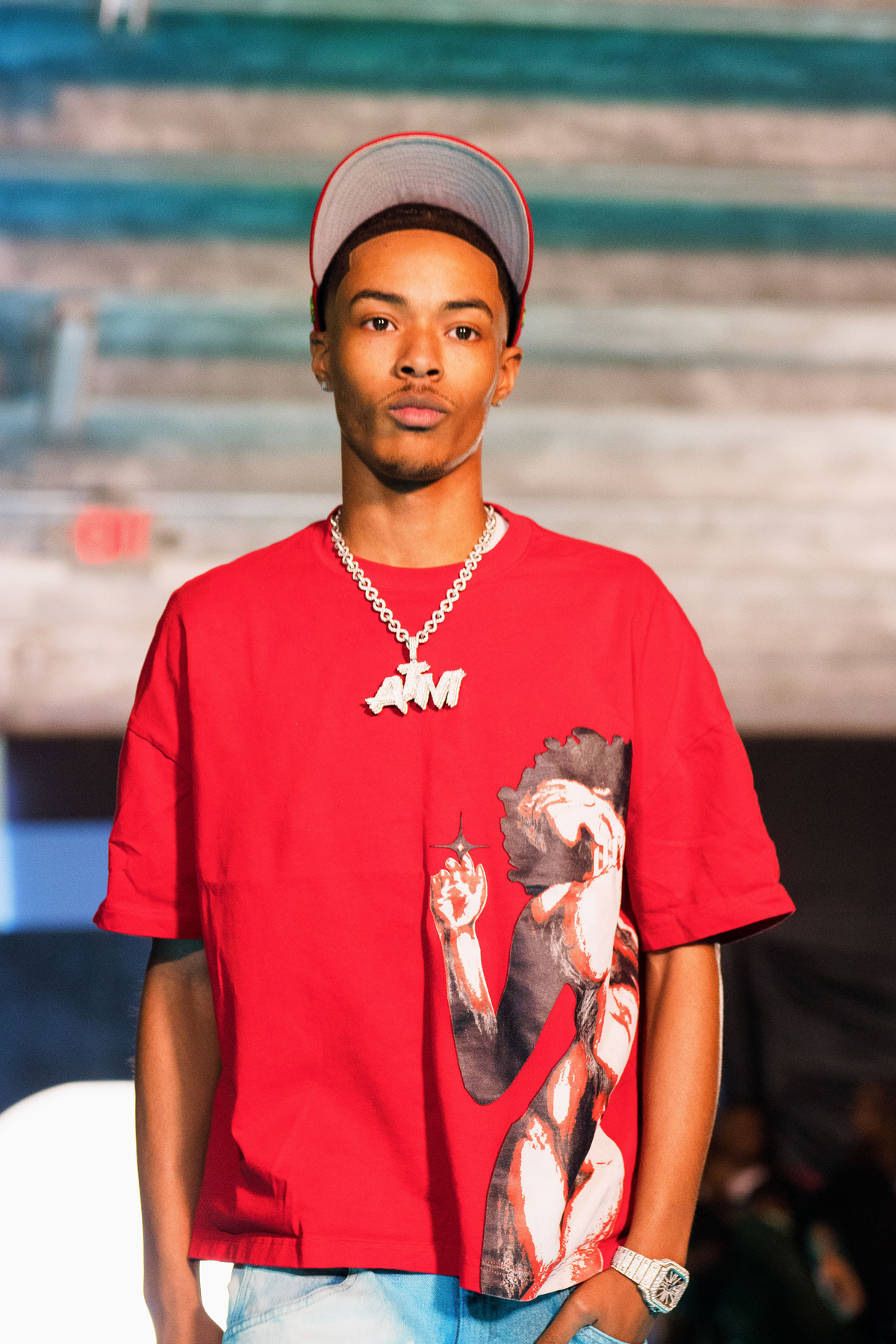 Red Seductive Impulse T-shirt by De Vinci, casual fit, displayed on a plain background, showcasing its vibrant color and simple style.
