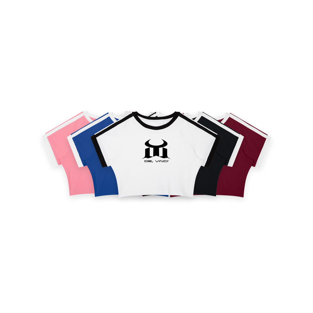 ODMPOD Femme Raglan Baby Tee crop top with short sleeves and casual fit, styled as a trendy women's fashion top.